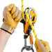 Professional wearing gloves using the Petzl Rig descender ergonomic handle which allows unlocking the rope and
comfortably controlling the descent.