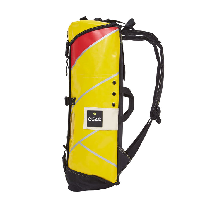 Side view of Courant Cross Evo Bag  showing shoulder straps and handles 