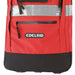 Front bottom closeup view of Edelrid PPE 45 litre backpack in Red and black showing reflective stripe, logo and zip pockets on the front 