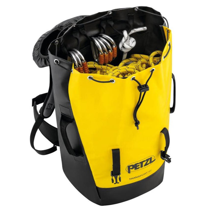 Upright Transport 60 Litre backpack full of ropes and carabiners. Showing a user can easily access their equipment, even when the pack is sitting open on the ground.