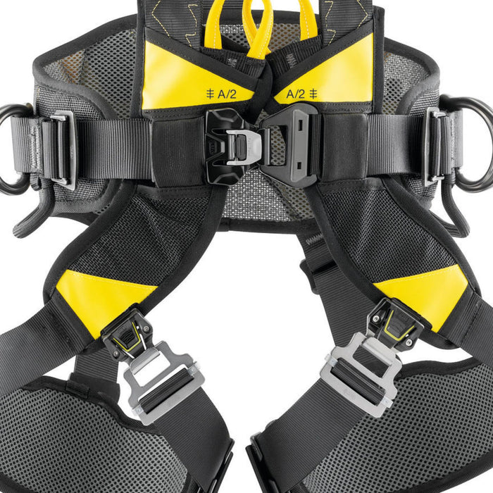 Close up of Petzl Volt Wind European Version Harness waistbelt and leg loops equipped with FAST LT PLUS and FAST LT buckles, allowing the harness to be easily donned while keeping both feet on the ground. These buckles retain their adjustment settings between donnings.